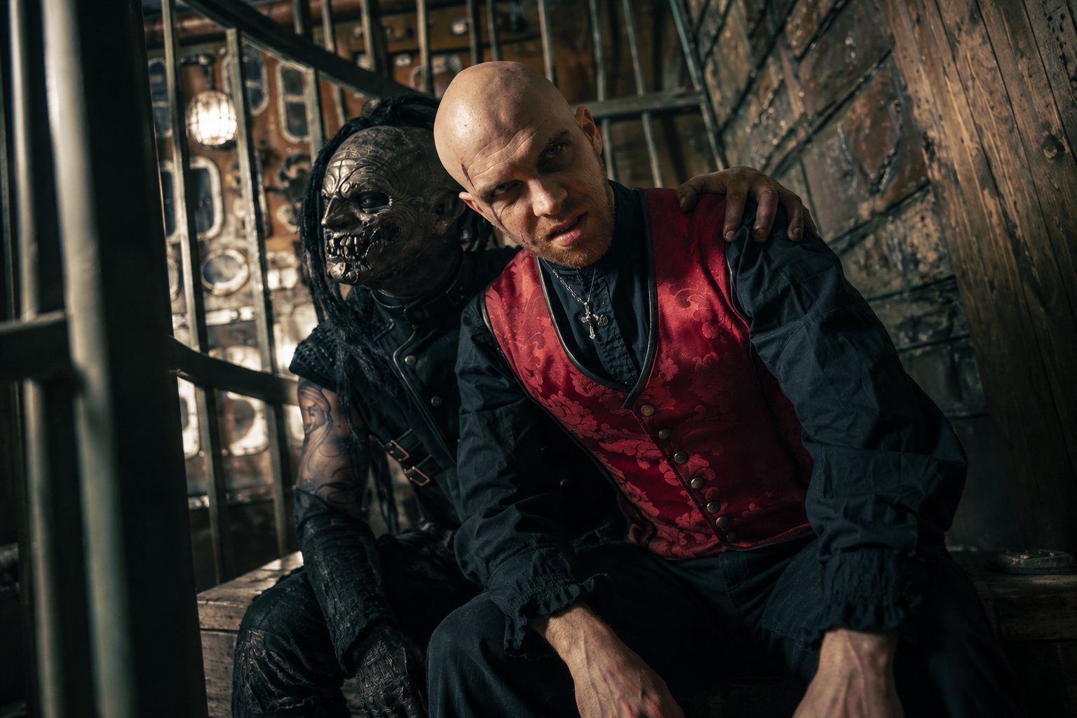 Dominum in zombie make-up on stage, Dr. Dead and Tommy Kemp in masks