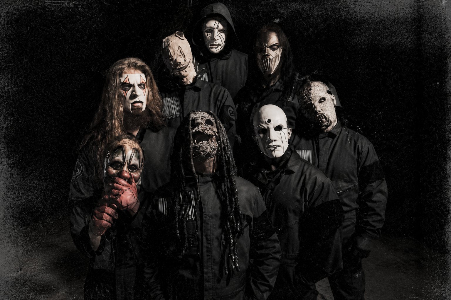 Slipknot members in masks; single 'Arsenal' artwork and band logo